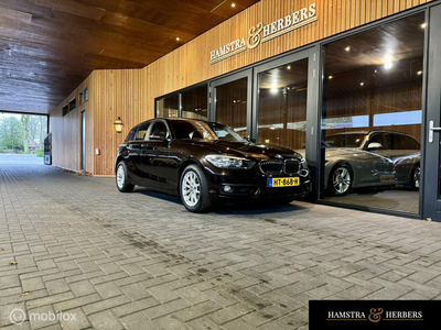 BMW 1-serie 118i Bruin Metallic, automaat