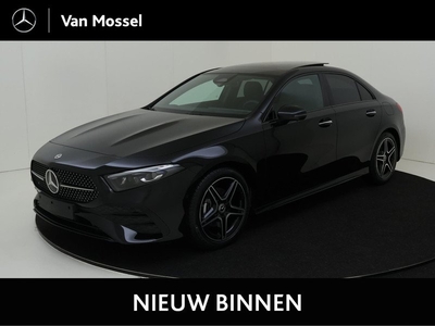 Mercedes-Benz A-klasse 180 AMG Line, stoelverwarming, achteruitrij camera, memory stoelen, panodak, night pakket.