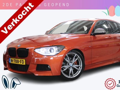 BMW 1-serie 118i M Sport Edition High Executive | Incl. 1 jaar garantie | Schuif/kanteldak | 18 inch Breedset | Cruise | Full M-sport | ac schnitzer uitlaat | Zwarte hemel | Stoelverwarming | Navi | Bi-xenon koplampen | DAB | M135i look |