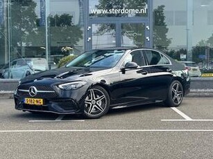 Mercedes-Benz C-KLASSE 180 AMG Line l AMG styling l MBUX l DAB l Keyless Start l Stoelverwarming l achteruitrijcamera l Sfeerverlichting l Airco l LED l Spoorassistent l Spiegel pakket l Navi via Apple Carplay of Android auto ( Mercedes-Benz Me )l