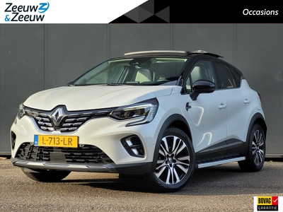 RENAULT CAPTUR 1.6 E-Tech Plug-in Hybrid 160 Initiale Paris Navi | Bluetooth | Camera | Leder | Schuifkantel dak | Two tone lak | Vierseizoenen banden | Bovag garantie | NAP