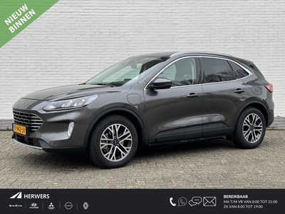 FORD KUGA 2.5 PHEV Titanium / Trekhaak / Navi / 360 Camera / Stoel & Stuurwiel Verwarming / Cruise Control Adaptief / Achterbank Verwarmd / Dodehoek Detectie / Lane Assist / Keyless / AppleCarPlay / Park Assist /