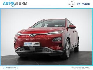 Hyundai Kona EV Premium 64 kWh | Head-Up Display | Navigatie | Camera | Leder | Adapt. Cruise Control | Stuur- + Stoelverwarming | Rijklaarprijs!