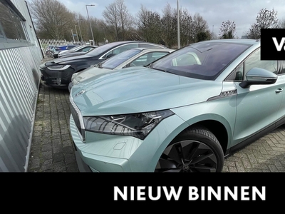 SKODA ENYAQ IV 60 First Edition 58 kWh | Trekhaak | Adaptive cruise control | Lederen bekleding | Stoelverwarming voor + achter |