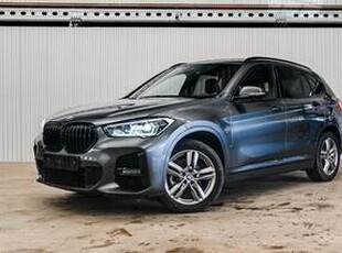 BMW X1 sDrive 18i / M-Pakket / LED / Navi / Camera / Stoelverw./PDC