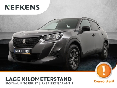 PEUGEOT 2008 SUV Style 100pk | Navigatie | Achteruitrijcamera | Climate Control | Cruise Control | Parkeersensoren | Led koplampen | Apple Carplay | Bluetooth | DAB+ radio | Donker getint glas | Lage kilometerstand! | 16