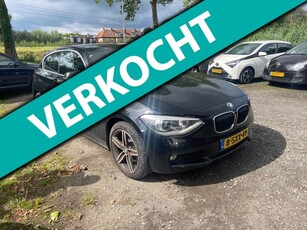 BMW 1-serie 114i Upgrade Edition Motorschade