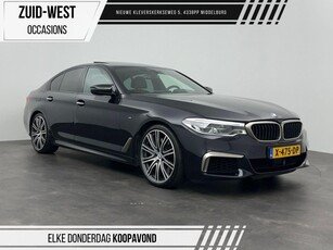 BMW 5 Serie M550i xDrive High Executive B&W