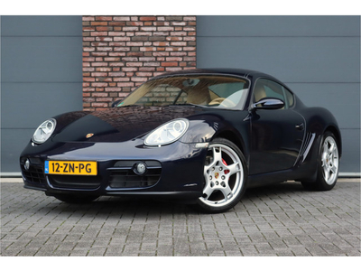 Porsche Cayman 2.7, Porsche Stability Management, Audiosysteem Porsche CDR 24, Elek. Stoelen, Leder/Alcantara, Parkeerhulp, Sound-Package Plus, Bi-xenon, Etc.