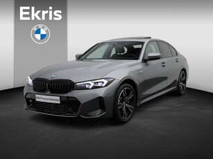 BMW 3 Serie Sedan 320e M Sportpakket Pro | Travel Pack | Innovation Pack | Entertainment Pack | Stuurwielrand Verwarmd | Trekhaak | Schuifdak | Driving Assistant | DAB | HiFi | 18''