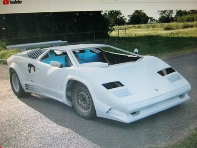 Bouwpakket lamborgini met twee pontiac Fiero auto,s