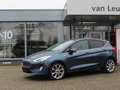 Ford Fiesta 1.0 ECOBOOST TITANIUM AUTOMAAT CRUISE APPLE/ANDROID NAVI CLIMA STOEL/STUUR/VOORRUIT VERW CAMERA TREKHAAK PARK-SENSOREN BLUETOOTH EL-SPIEGELS 17'' LM-VELGEN