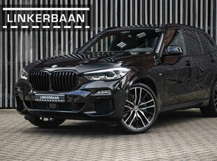 BMW X5 xDrive45e Hybride | M Sport | Achterasbesturing | Panodak | H&K | 22 inch |