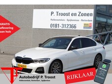 BMW 3-serie 320i High Executive Edition Orig. NL/M-pakket/Digitale cockpit/Lederen bekleding/Achteruitrijcamera/Navigatie/Sfeerverlichting/C