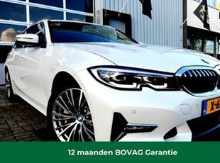 BMW 3-SERIE Touring 330i xDrive High Executive NAV/LEER/PANO