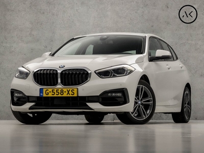 BMW 1-serie 118i Sport Automaat (DRAADLOOS CARPLAY, SFEERVERLICHTING, GROOT NAVI, HARMAN/KARDON, STOELVERWARMING, LEDER, SPORTSTOELEN, CRUISE, NIEUWSTAAT)