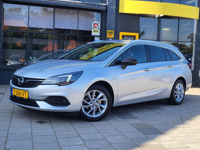 Opel Astra Sports Tourer 1.2 Blitz Elegance Incl. BTW | Park. Camera | Botswaarsch. | Half Leder | Tel | Nav | Apple Carp | Andr A