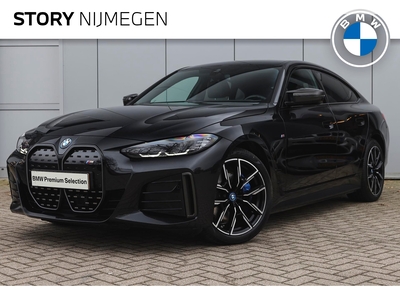 BMW I4 M50 High Executive 84 kWh / Trekhaak / Active Cruise Control / Adaptief M Onderstel / Parking Assistant / Live Cockpit Professional