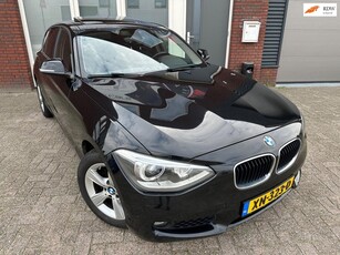 BMW 1-serie 118i High Executive / Pano / PDC / Navi / Clima / Stoelverwarming