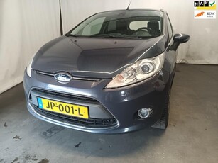 Ford Fiesta 1.4 Titanium - Airco - Achter Schade