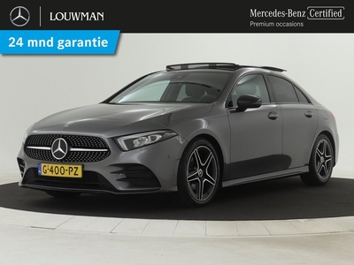 Mercedes-Benz A-Klasse 180 Business Solution AMG | 5 spaaks lichtmetalen velgen | MBUX wide screen | Navigatie | Panoramadak | Achteruitrijcamera | Nightpakket | Apple Carplay | Inclusief 24 maanden MB Certified garantie voor Europa.