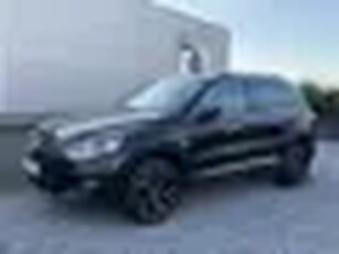 Volkswagen Tiguan 1.4 TSI Sport&Style NaviClimaCruisPDC Zwart