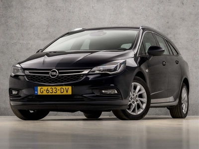 Opel Astra Sports Tourer 1.0 Turbo Executive Sport (APPLE CARPLAY, NAVIGATIE, CAMERA, KEYLESS, SPORTSTOELEN, LANE ASSIST, PARKEERSENSOREN, CRUISE CONTROL, ELEK ACHTERKLEP, DAB+, NIEUWSTAAT)