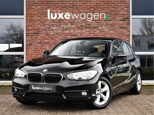 BMW 1-serie 116i 110pk Executive Navi Cruise Stoelverw PDC