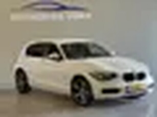 BMW 1-serie 116i High Executive Wit lichte schade