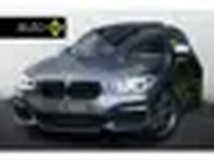 BMW 1-serie M140i xDrive High Executive / Schuifdak / H&K / Keyless