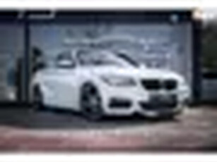 BMW 2-serie Cabrio 220i High ExecutiveM-PakketStuur/stoelverwAutSoftopLEDNaviLederVerlaagd