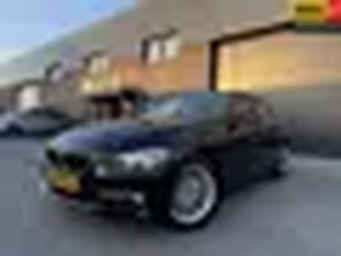 BMW 3-serie 320i Business 1E EIGENAAR 12MND GARANTIE AUTOMAAT NAVI CRUISE LEER LMV