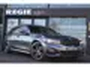 BMW 3 Serie Touring 318i M-sport Pano Livecockpit Hifi Leer Camera Led Navi