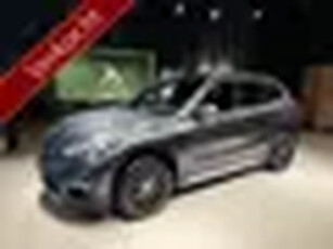 BMW X1 sDrive18i High Exe NaviLeerCameraKeylesLEDHeadup Grijs Metallic