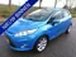 Ford Fiesta 1.4 Titanium ** Airco ** Bluetooth ** 5 DRS ** Stoelverwarming ** Trekhaak **