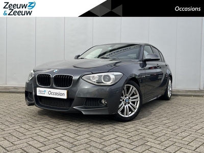 BMW 1-serie 116i High Executive Automaat | M-Pakket | Xenon Koplampen | Lederen bekleding | Stoelverwarming | 12 maanden garantie! |