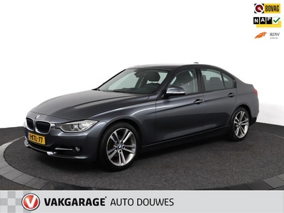 BMW 3-serie 320i High Executive AutomaatLeerNAP