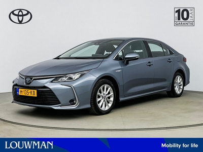 Toyota Corolla 1.8 Hybrid Active | Sedan | Trekhaak | Apple carplay & Andriod auto |