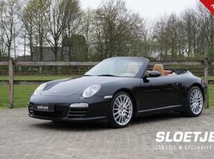 Porsche 911 Cabrio 3.6 Carrera |Motor gereviseerd |325 pk |Tiptronic S |2e eigenaar |Leder |Bose |Xenon |Verwarmde stoelen |Zwart metallic |Sportstuur |19