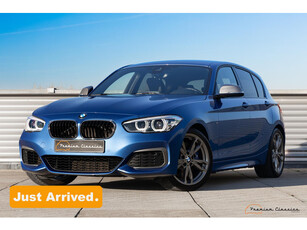 BMW 1-serie M140i High Executive | 27.000KM | 6-Speed Manual | Navigation Professional | Harman/Kardon | Reversing Camera