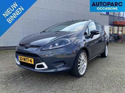 Ford Fiesta 1.25 Limited Sportieve fiesta met airco en een splinternieuwe koppeling