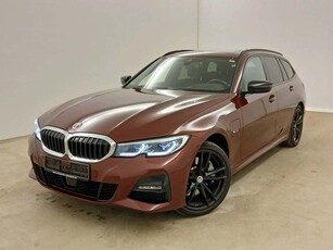 BMW 3 Serie Touring 330e xDrive M-Sport Aventurin rood