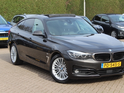 BMW 3-SERIE Gran Turismo 320i High Exe. M Sport / Panoramadak / Head-up / Camera / Leder / Navigatie / Cruise Control