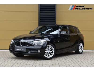 BMW 1-serie 114i Business+ * Sportline * Stoelverwarming * Leder * Trekhaak *