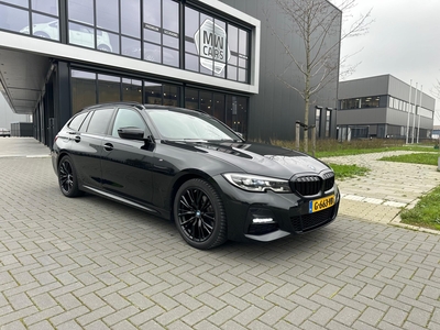 BMW 3-SERIE Touring 320i High Exec M-Sport Pano HK Gratis onderhoud 12-2027 136.500 km