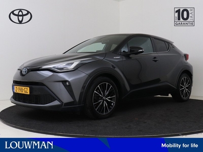 Toyota C-HR 1.8 Hybrid Executive Bi-Tone I Navigatie I Climate Control I Cruise Control I Camera I LM velgen I JBL | Dodehoek detectie | Volledig dealer onderhouden I Stoelverwarming voor I Subwoofer I