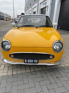 Hele mooie Nissan Figaro in Eierdooier geel met nieuwe motor