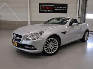 Mercedes-Benz SLK-KLASSE 200 Airco Leer Airscarf Navigatie Panoramadak Nekverwarming Dealer onderhouden Stoelverwarming Cruisecontrol Parkeersensoren Multifunctioneel stuurwiel Sportvelgen 17 inch Boekjes aanwezig