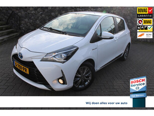 Toyota Yaris 1.5 Hybrid Design Climate + cruise, Camera, navi. trekhaak, lm velgen, all season banden.