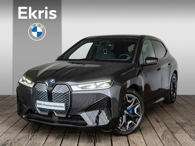 BMW IX xDrive40 High Executive 77 kWh / Glazen panoramadak Sky Lounge / HIFI System Harman Kardon / Trekhaak - Spring Sale